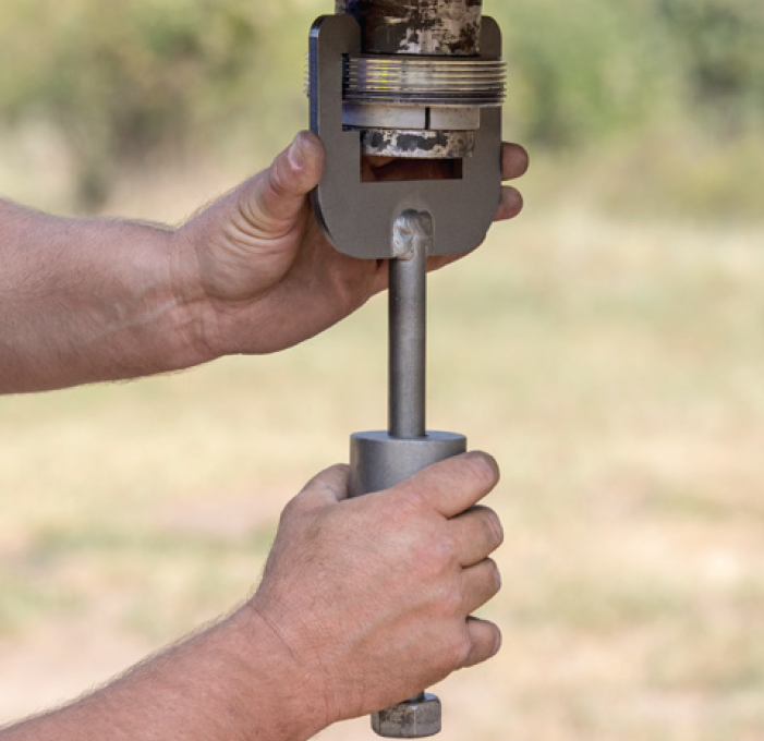 Installing an Andersen Ranch Hitch 5th wheel to gooseneck adapter using the #3103 Slide Hammer tool to secure the split collar halves to the trailer kingpin in a more square image.