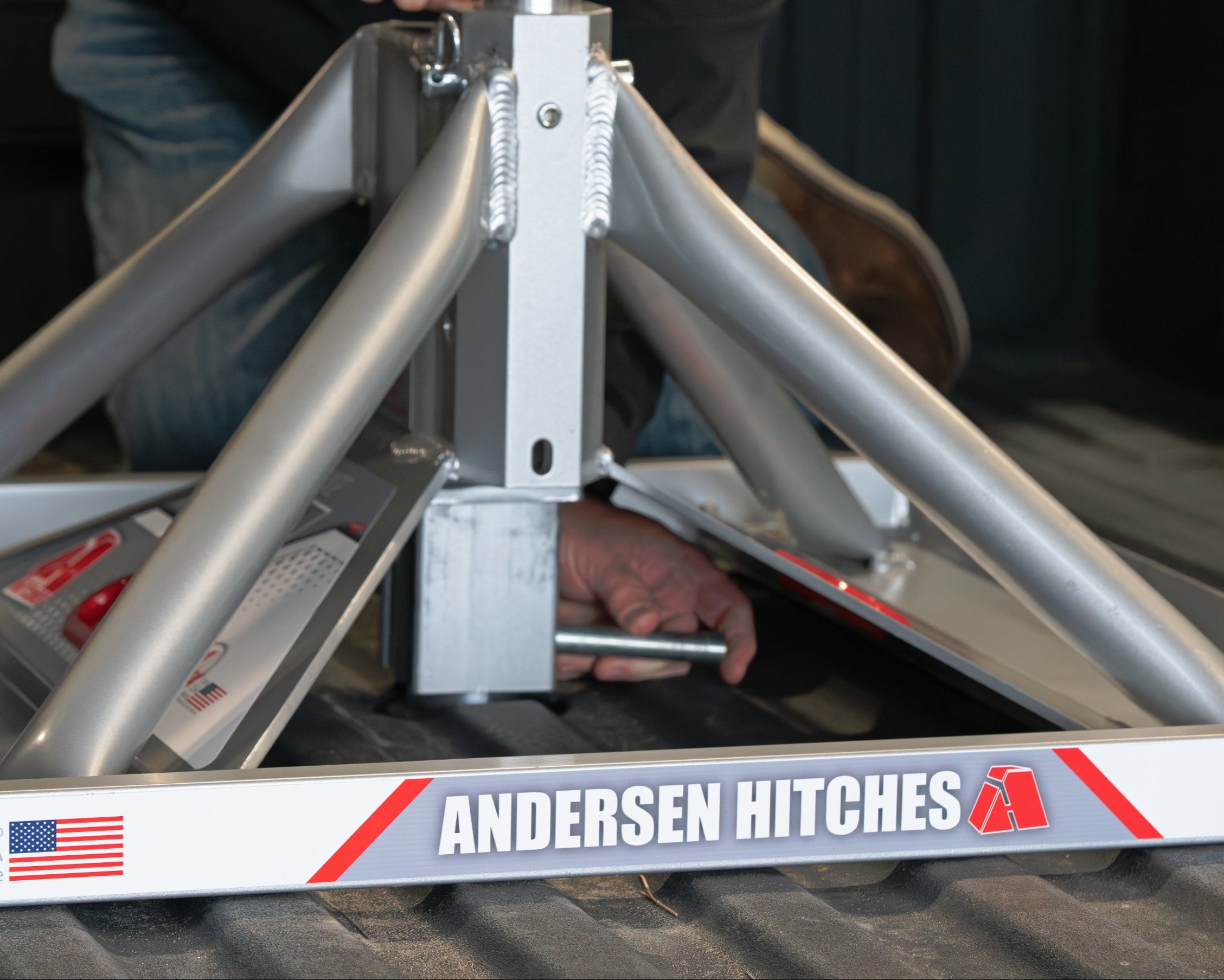 Man putting pin in an Andersen Hitches Ultimate 5th Wheel Connection